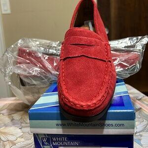 Traditional penny loafer. Slip on style.